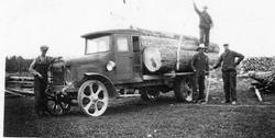 Hauling Logs in an Old Truck